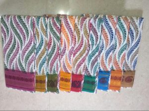 White based Sungudi cotton fancy print sarees with leaf design