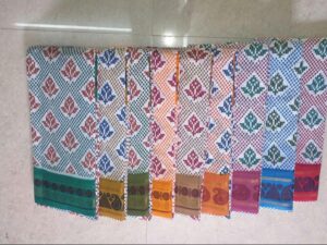 White based Sungudi cotton fancy print sarees with rose design