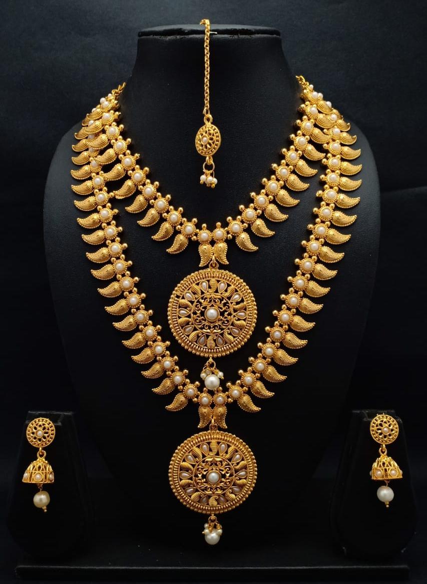 Chidambaram covering gold platted manga mala with pearl haram - Native ...